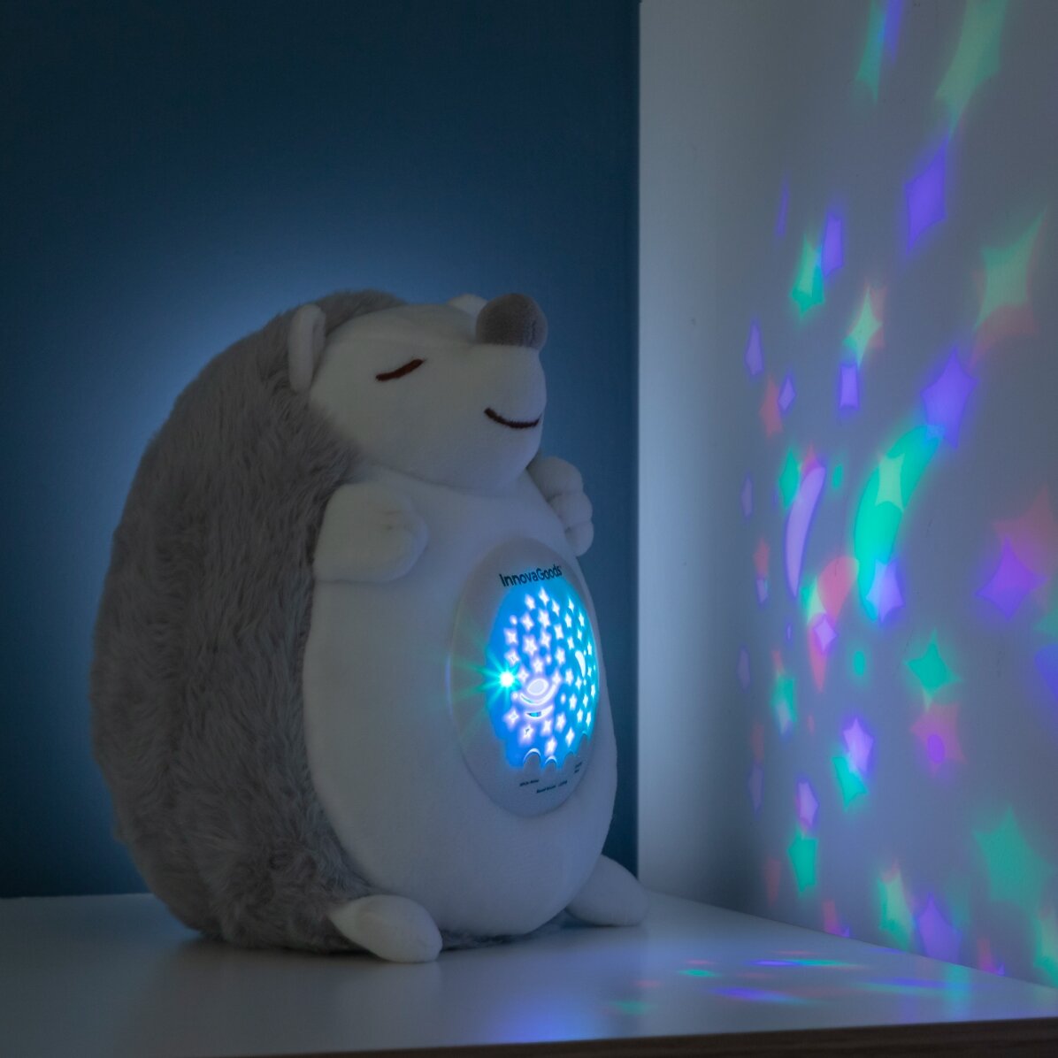 Peluche de erizo con proyector de luces y sonidos