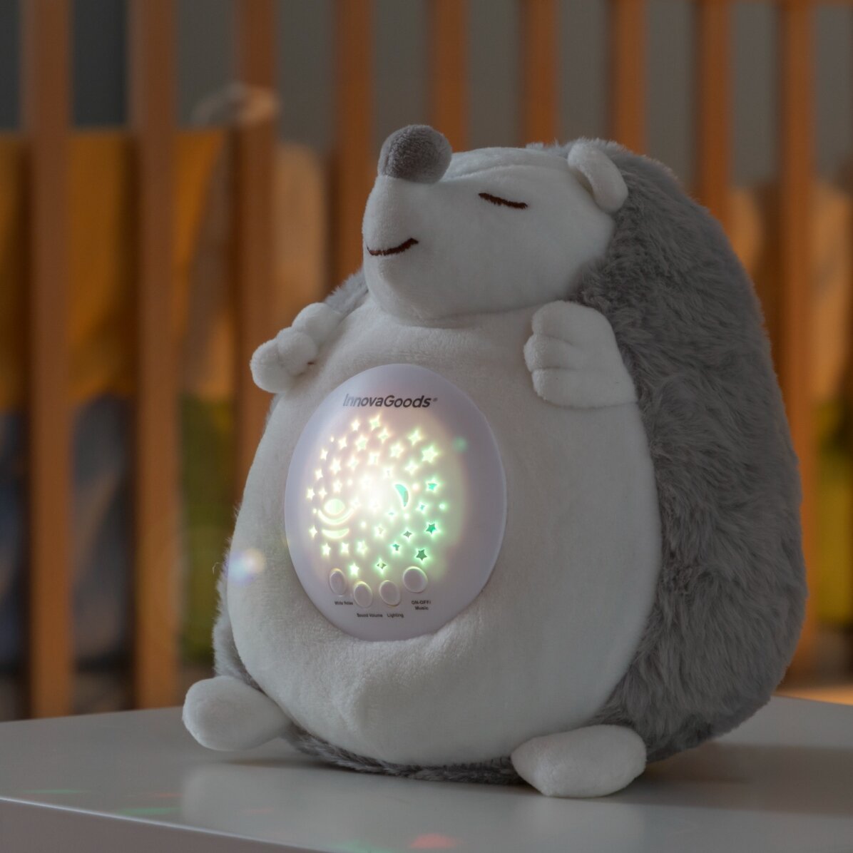 Peluche de erizo con proyector de luces y sonidos