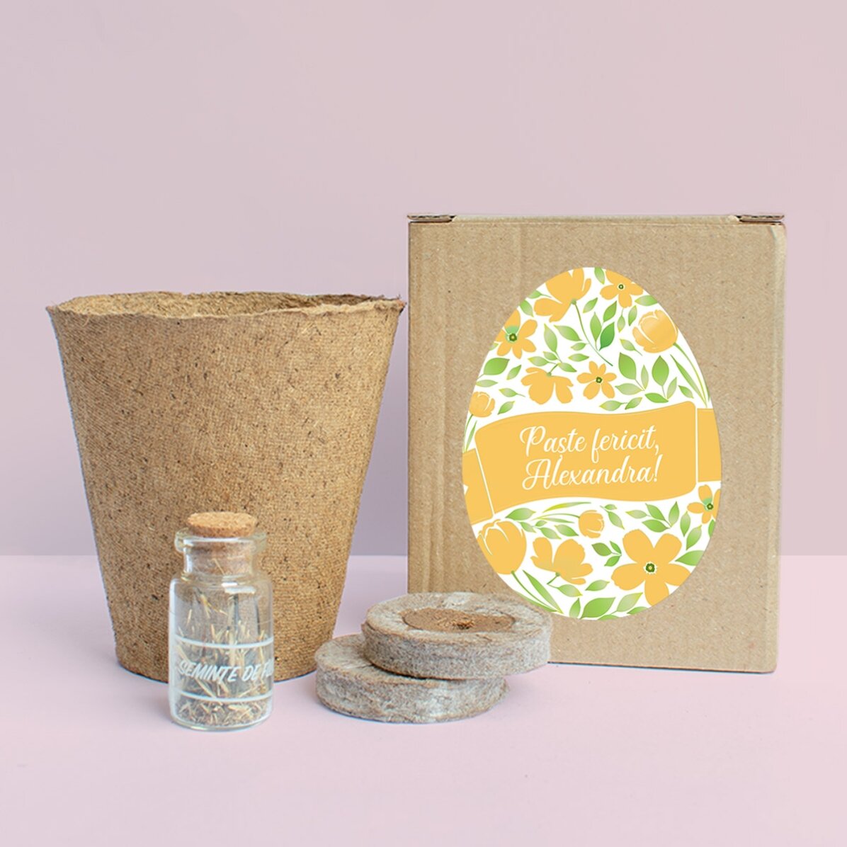 Kit para plantar flores en una cajita personalizada con el mensaje: «¡Feliz Pascua!»