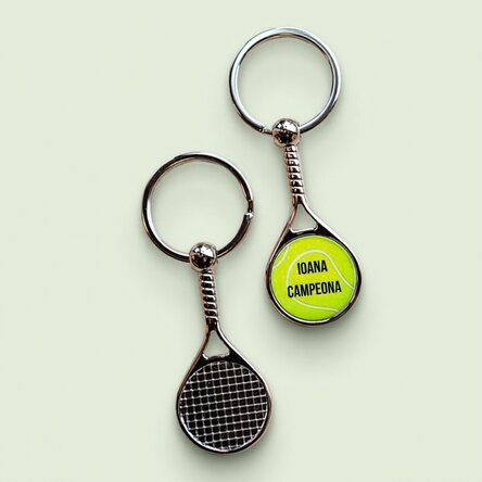 Llavero con forma de raqueta de tenis personalizado con el texto «Campeón»