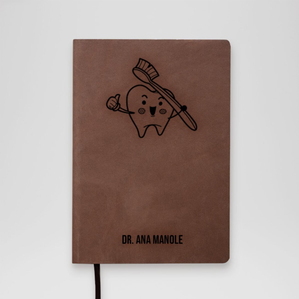 Agenda de piel personalizada con texto: «Médico dentista»