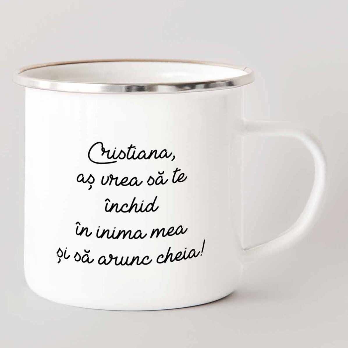 Taza metálica esmaltada con una foto y un texto