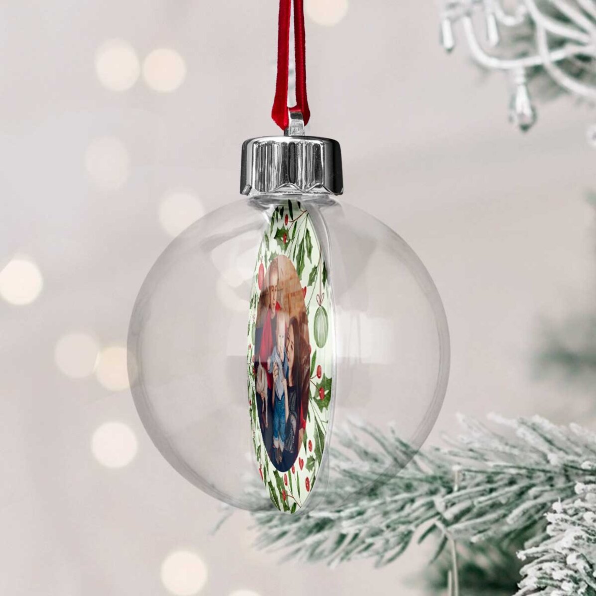 Bola de Navidad transparente personalizada por ambos lados con una foto y un mensaje: «Mi primera Na