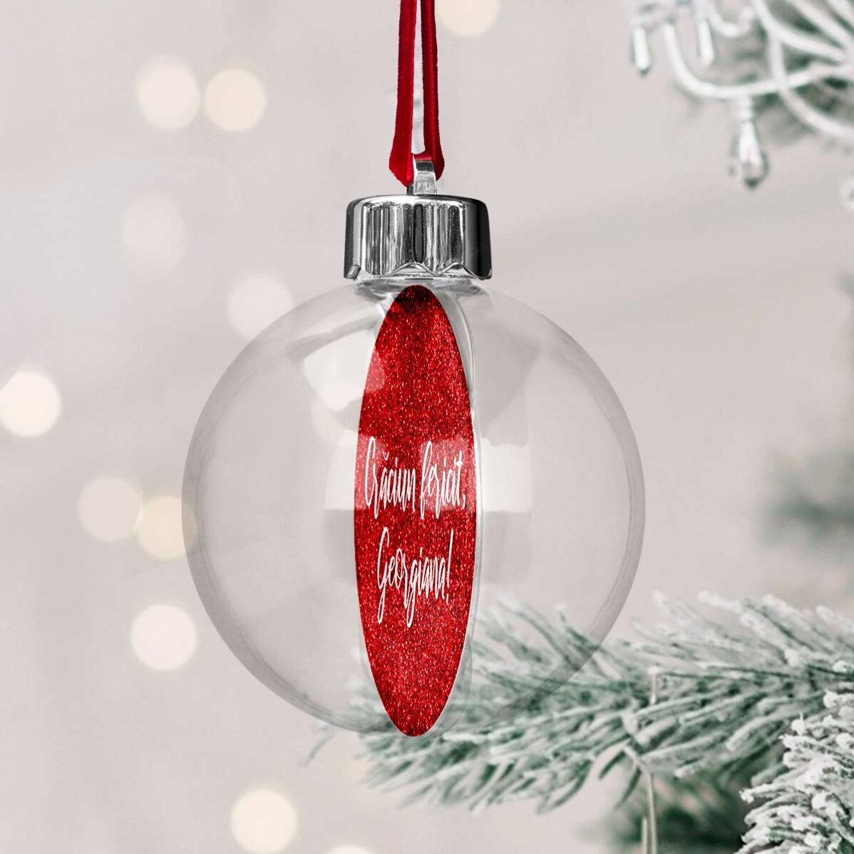 Bola de Navidad transparente personalizada por ambos lados con una foto y un texto: «¡Feliz Navidad!