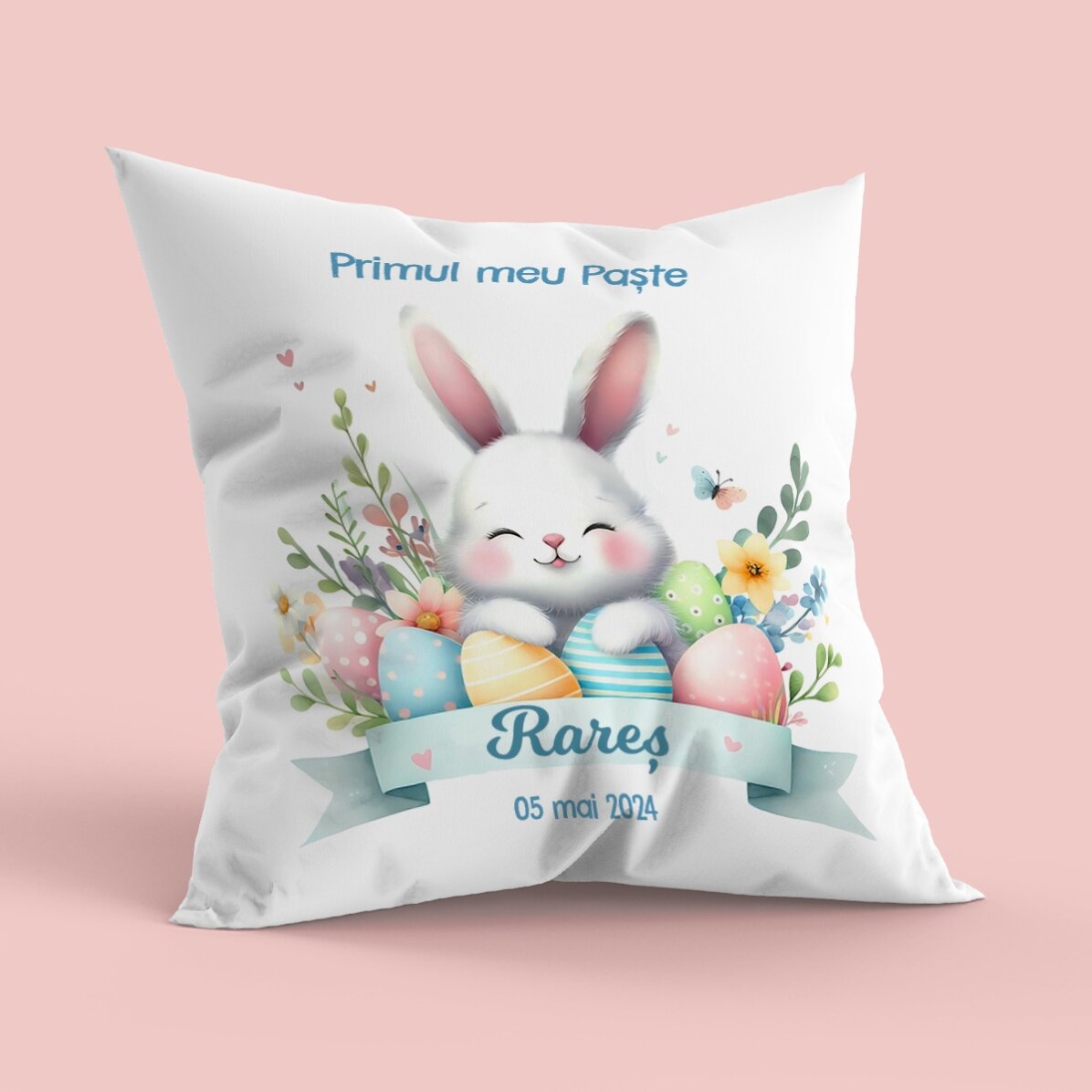 Cojín personalizado con texto: «Mi primera Pascua»