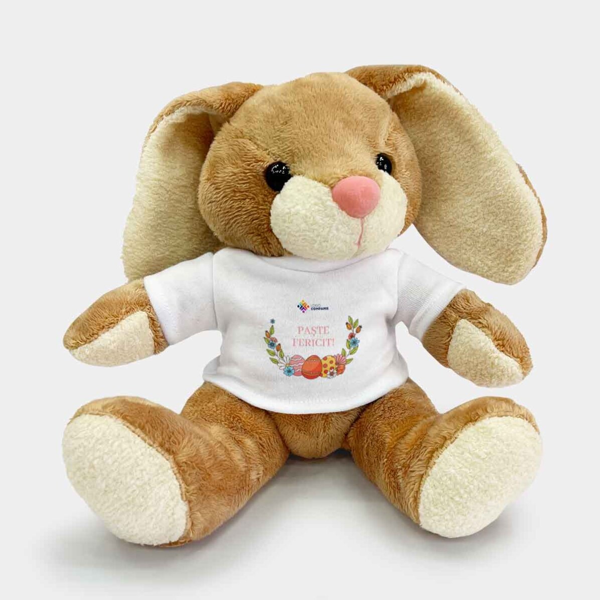 Además, un conejito personalizado con el logotipo y un mensaje de Pascua