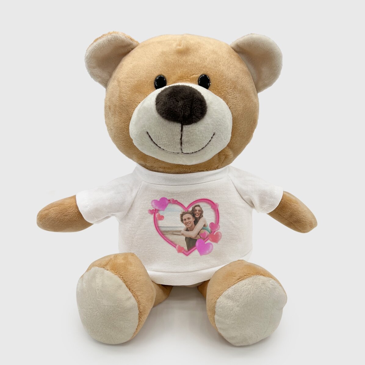 Además, un osito personalizado con una foto y corazoncitos