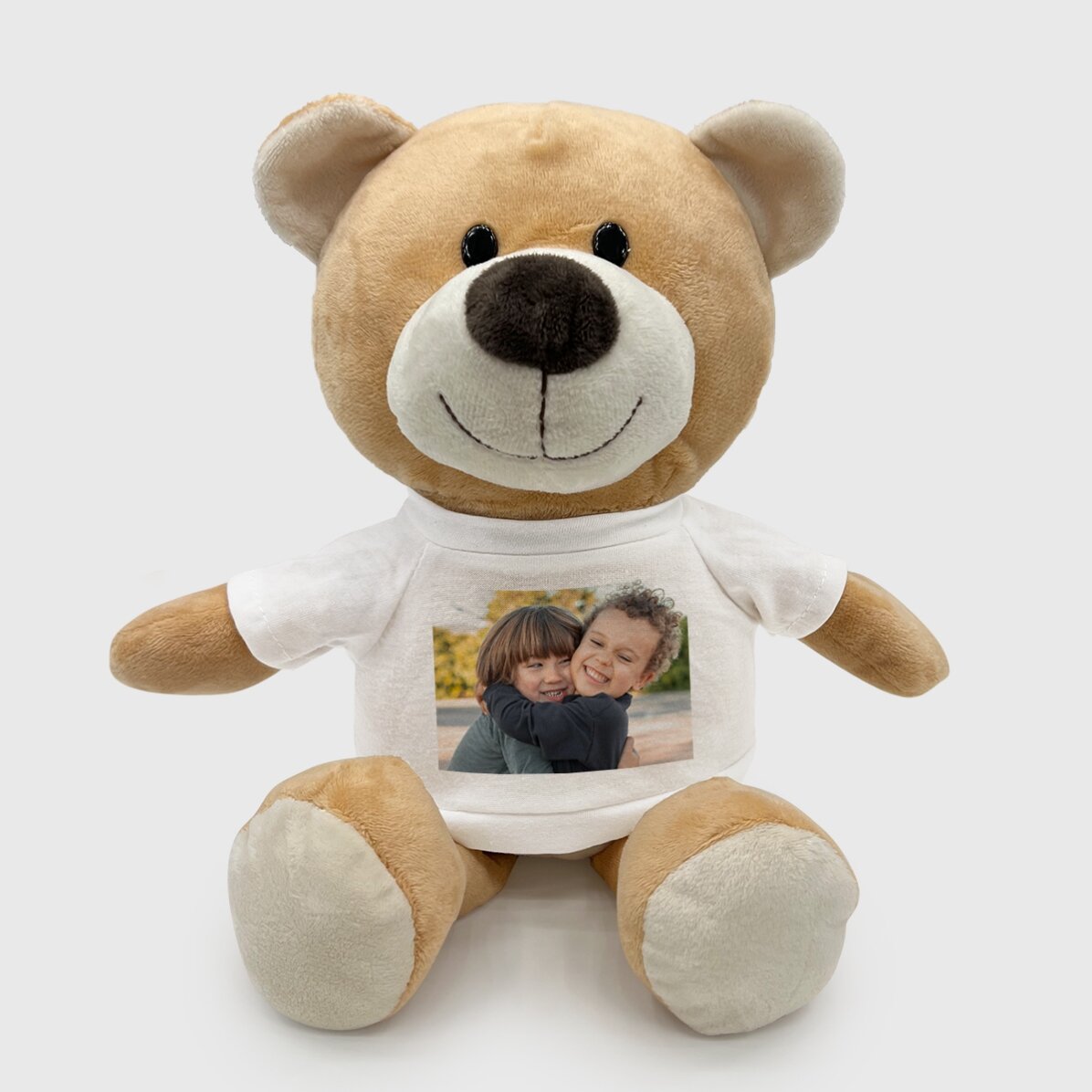 Además, un osito personalizado con una foto