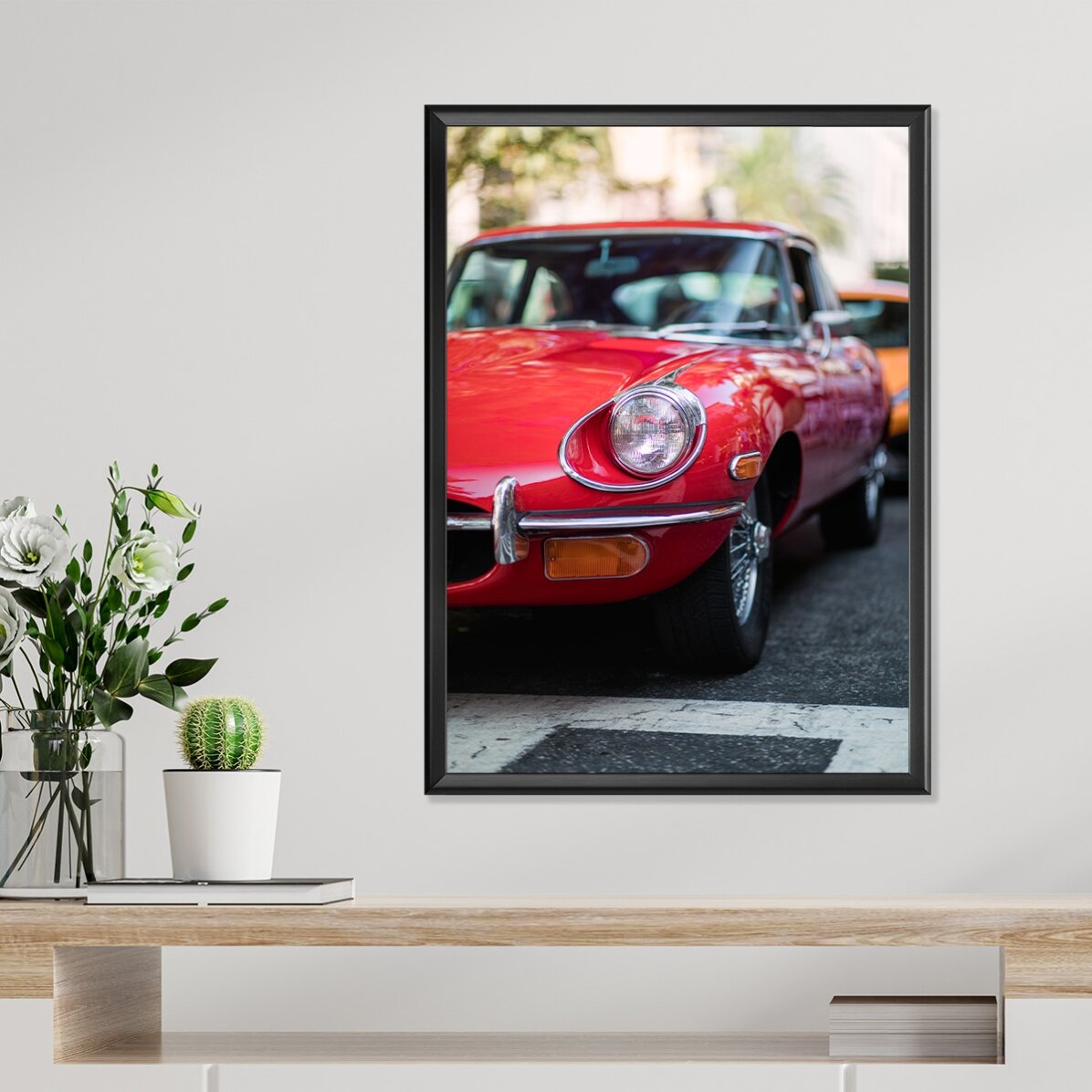 Póster de un coche rojo vintage