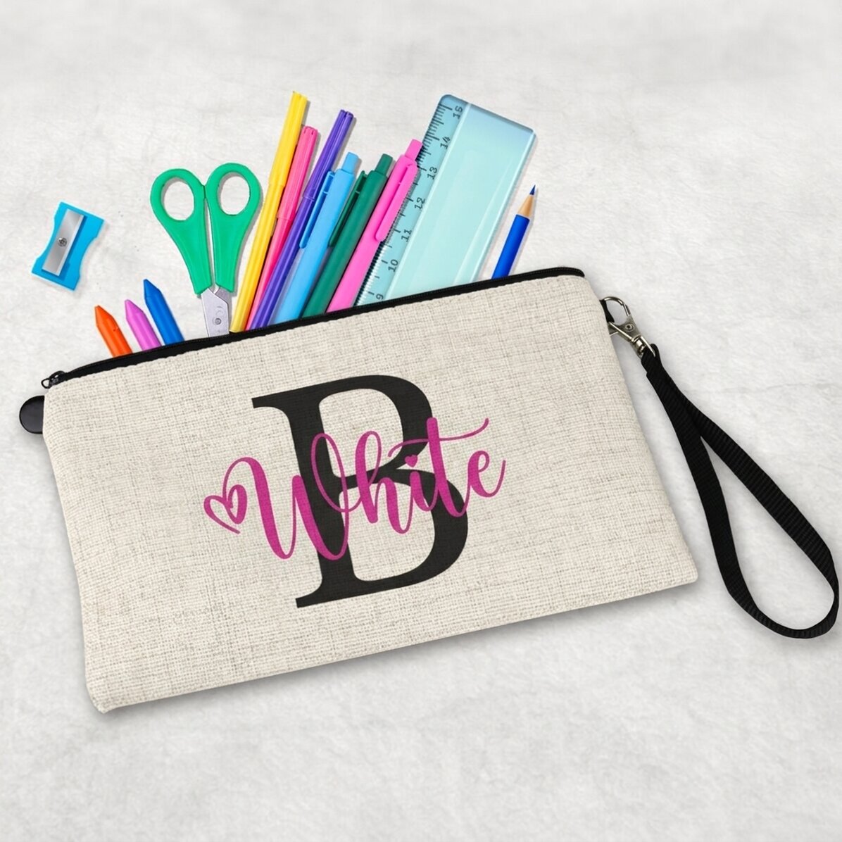 Estuche escolar personalizado con la inicial y el nombre
