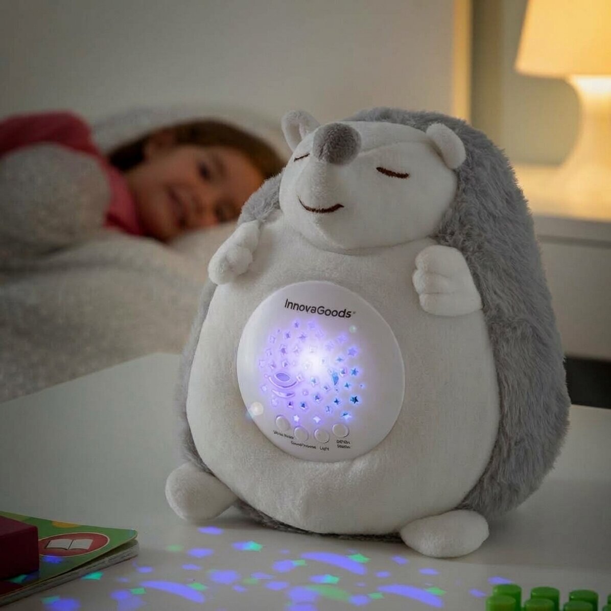 Peluche de erizo con proyector de luces y sonidos