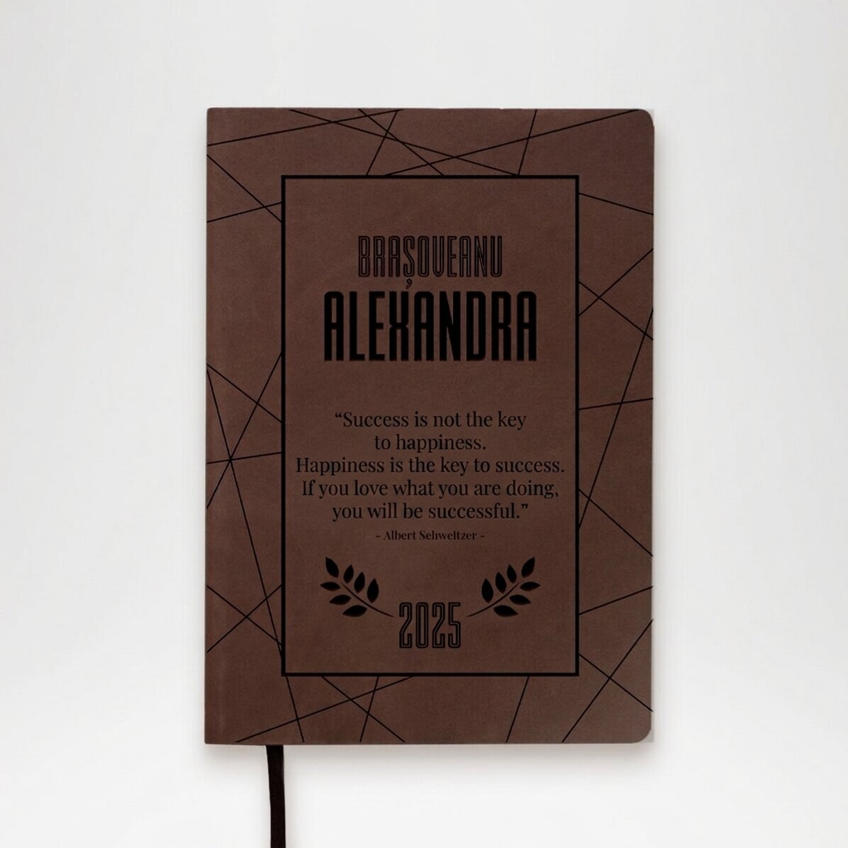 Agenda de piel personalizada con una cita motivadora sobre el éxito