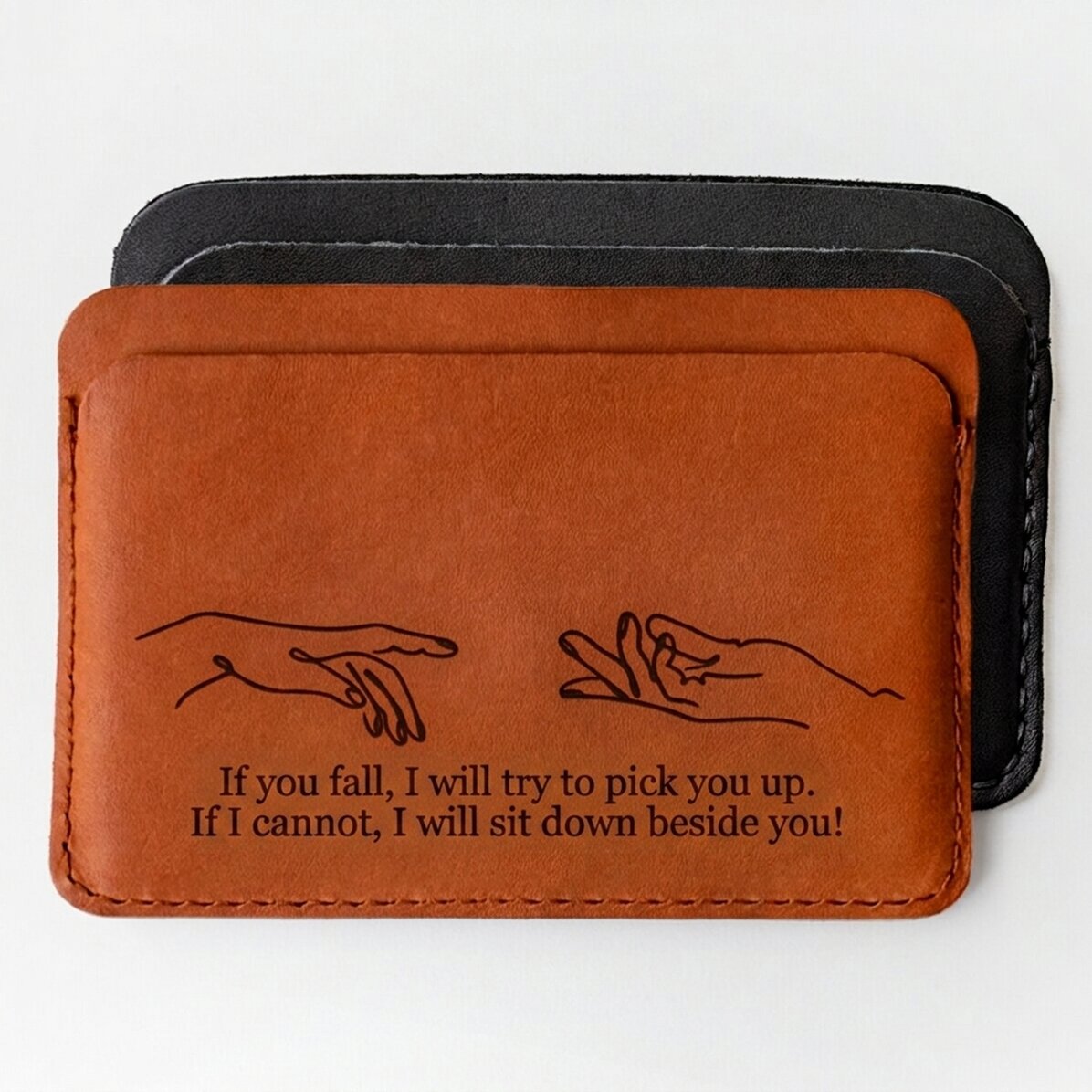 Cartera de piel personalizada con mensaje: «Si te caes...»