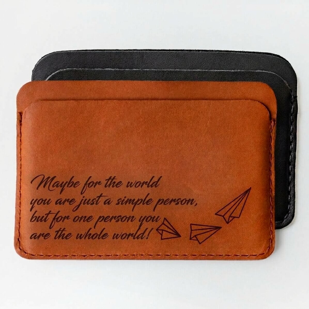 Cartera de piel personalizada con mensaje: «¡Eres el mundo entero!»