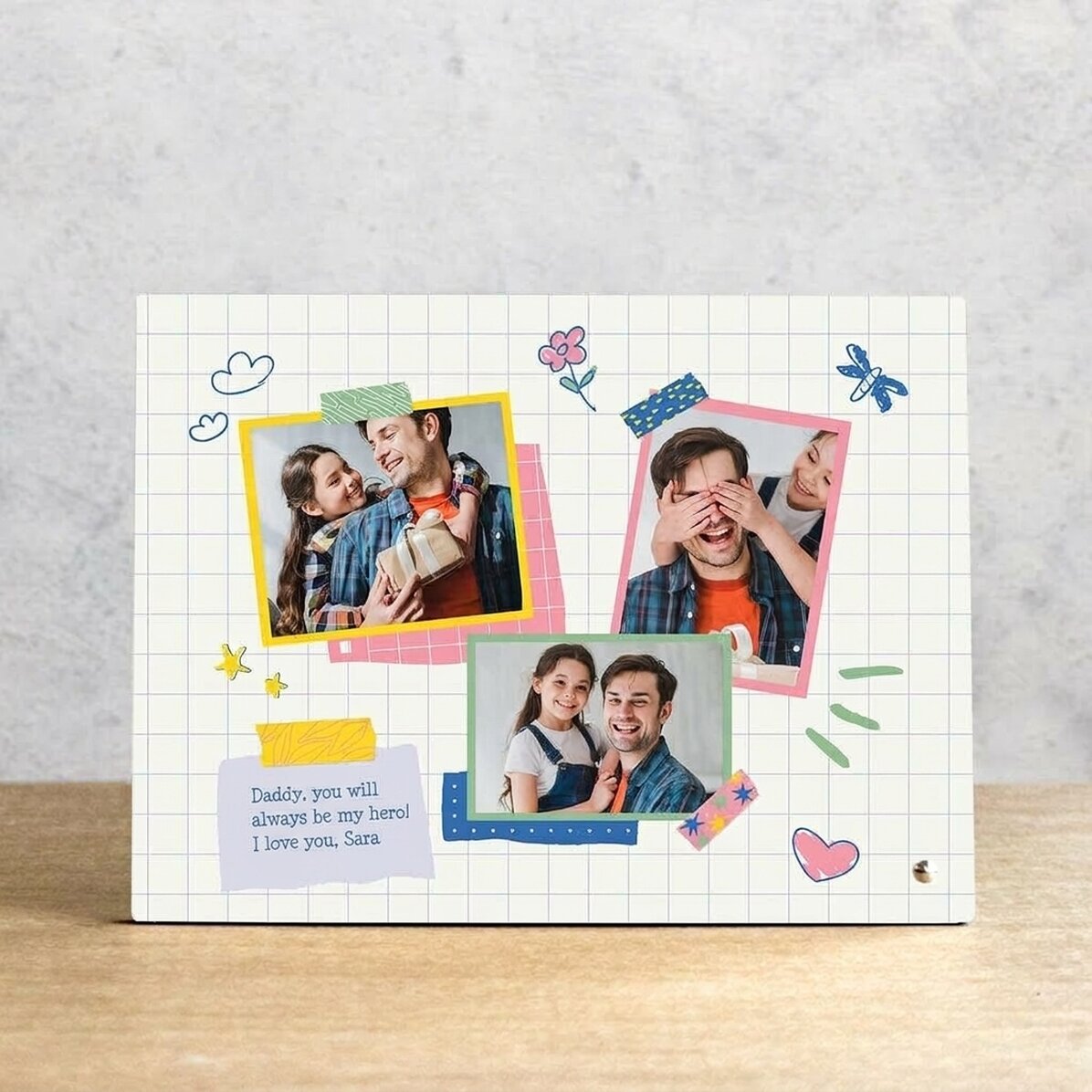 Marco de fotos de escritorio personalizado con 3 fotos y un mensaje: «Papá, mi héroe»