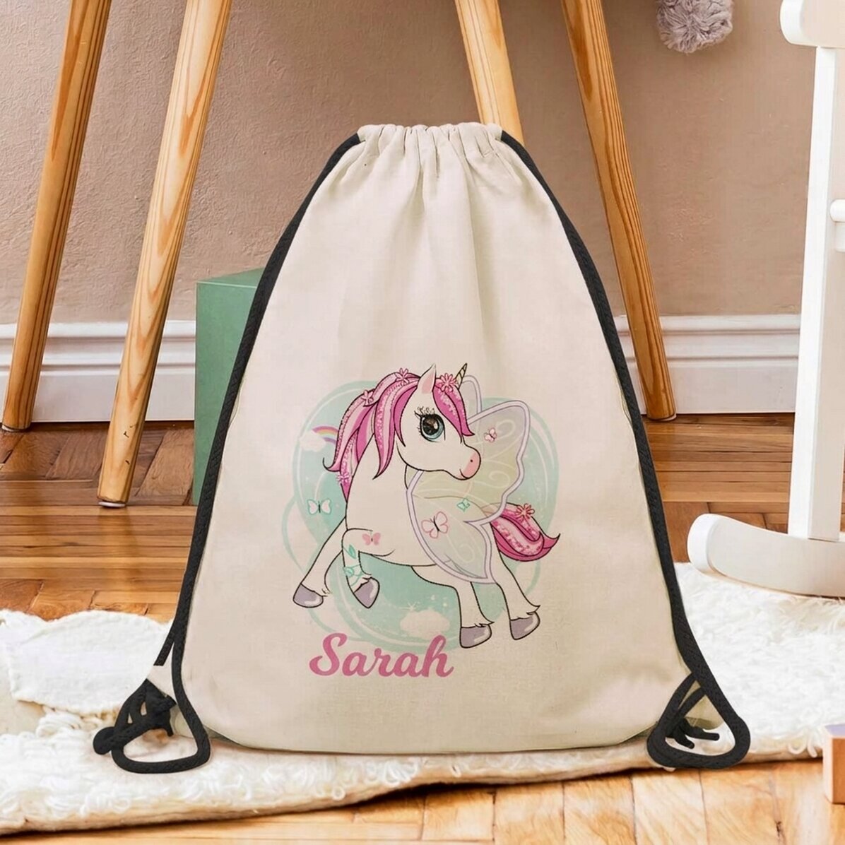 Mochila personalizada con nombre: unicornio y mariposas