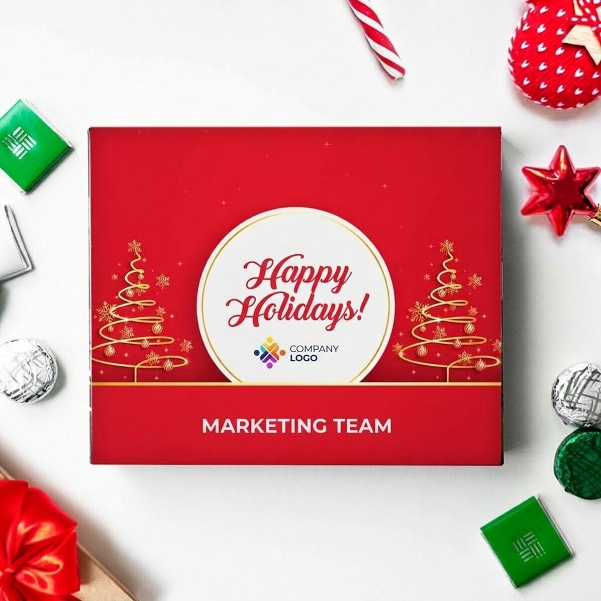 Caja de bombones personalizada con logotipo y mensaje: «Felices fiestas»