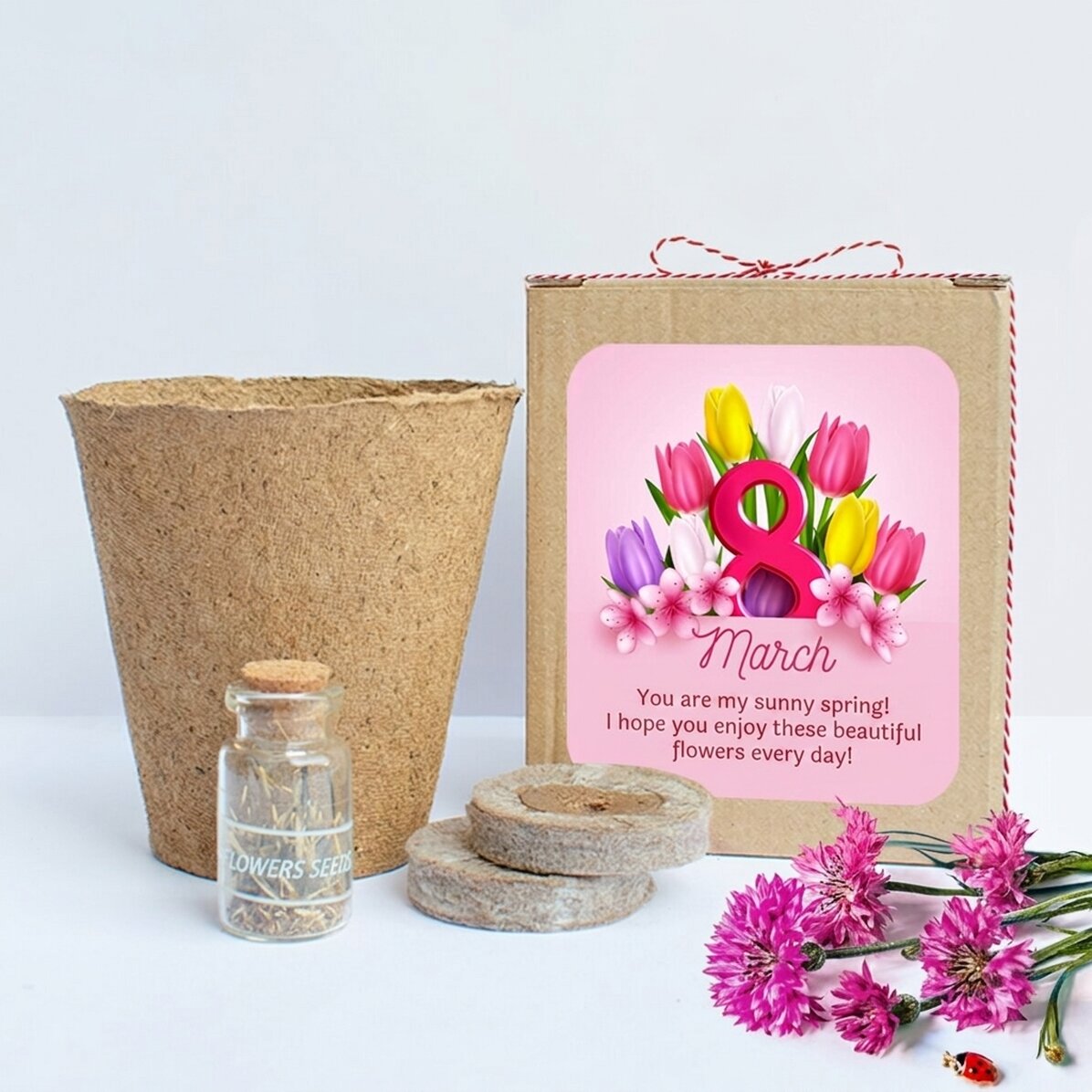 Kit para plantar flores de primavera en una cajita personalizada con un mensaje para el 8 de marzo