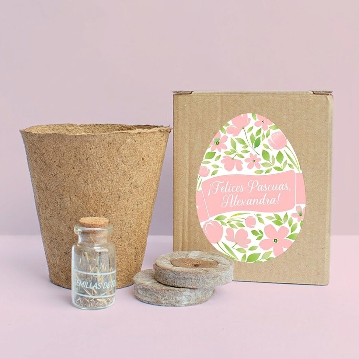 Kit para plantar flores en una cajita personalizada con el mensaje: «¡Feliz Pascua!»