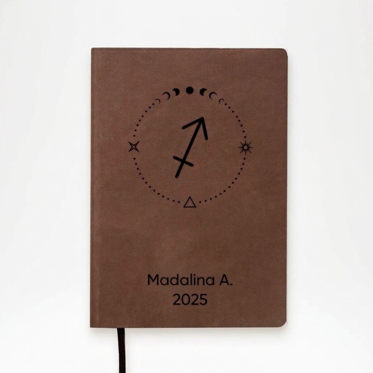 Personalised leather diary with text and Sagittarius zodiac sign