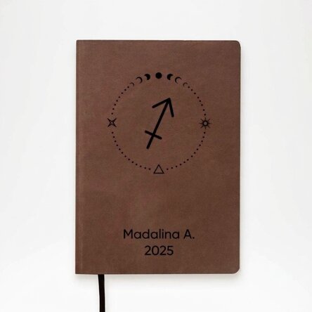 Personalised leather diary with text and Sagittarius zodiac sign