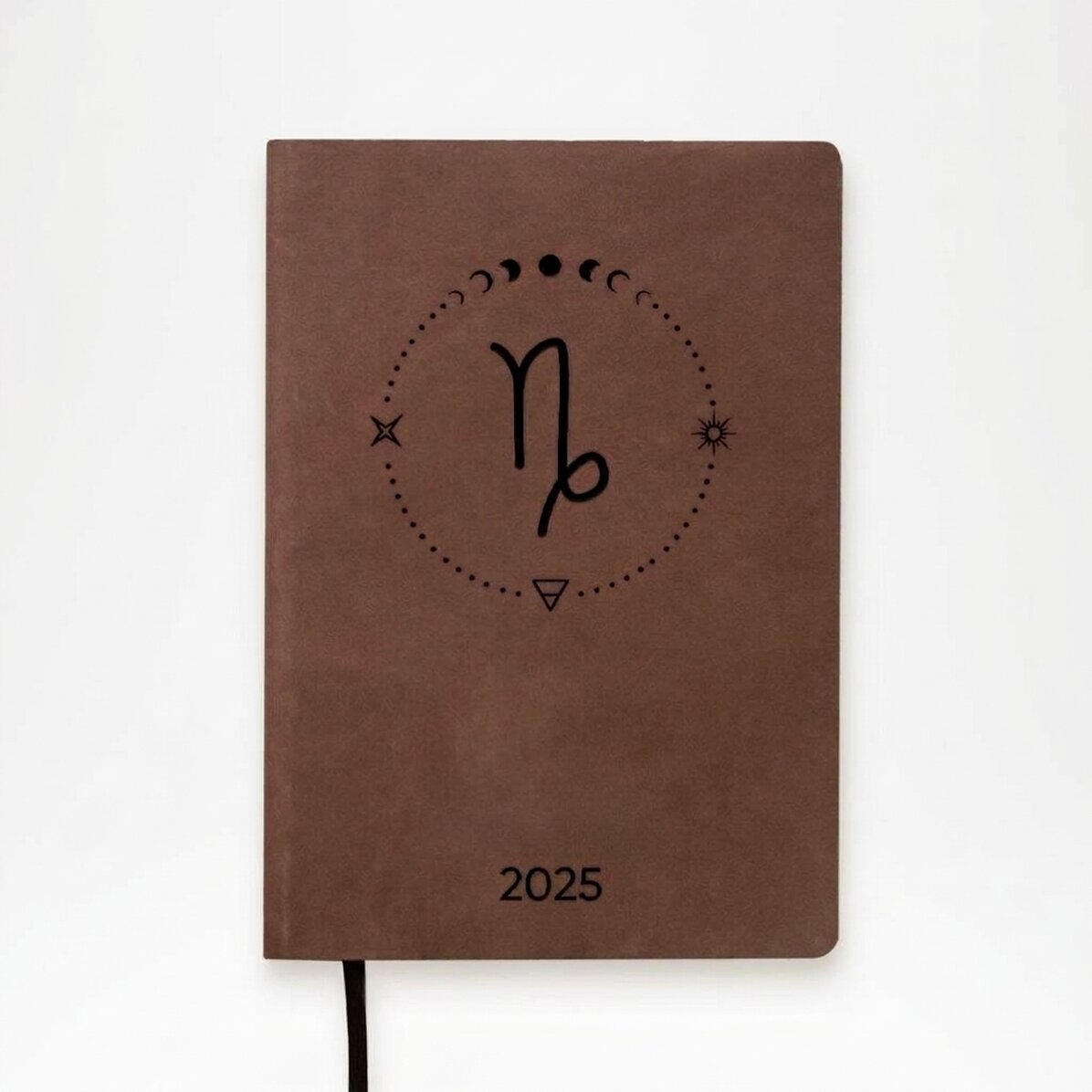 Agenda de piel personalizada con texto y el signo del zodiaco Capricornio