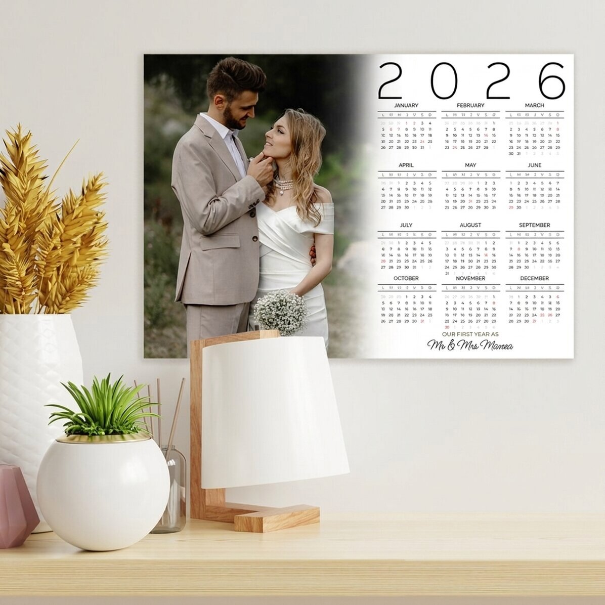 Póster calendario personalizado con una foto y un mensaje: «Nuestro primer año»