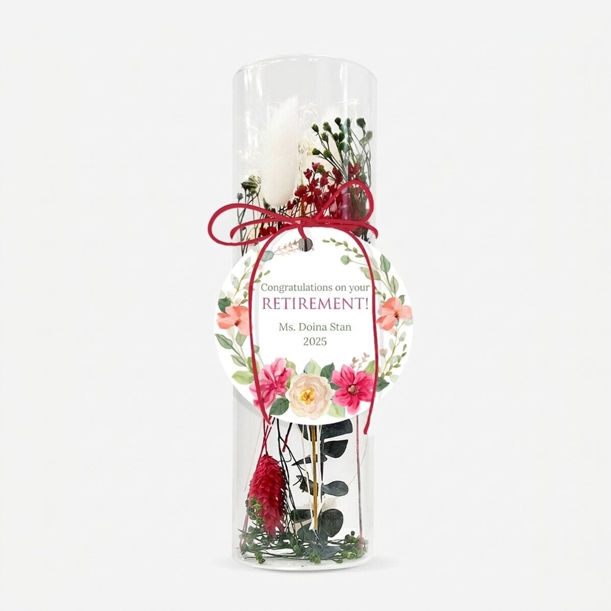 Adorno de cristal con flores preservadas, personalizado con un texto: «Jubilación»